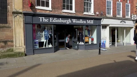 The Edinburgh Woollen Mill store on High Street Worcester Stock Footage 273510880