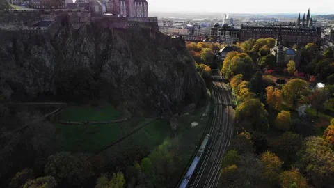 Edinburgh's train station and the castle Stock Footage