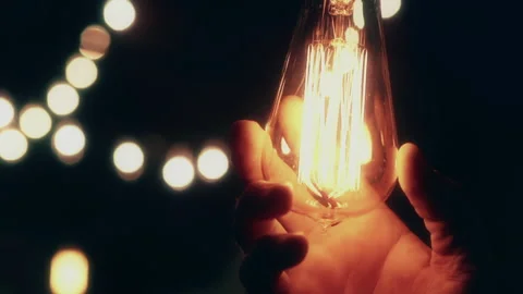 Edison Bulb Being Turned On By Hand 4k Stock Footage 163836946