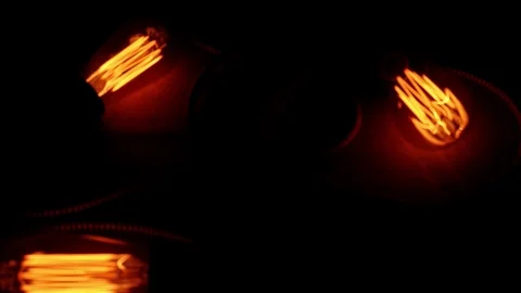 Edison bulbs background. Orange light. B... | Stock Video | Pond5