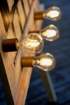 Edison bulbs, screwed into a rectangular frame.Mirror make-up artist, the Foto stock