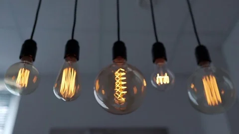 Edison lamp is glowing, electric bulb, turning the lights on, electric light Stock Footage 80692989