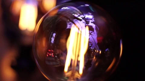 Edison Light Bulb Flickering in dj disco night club concert Light bulb on dar Vídeos de archivo 107340412