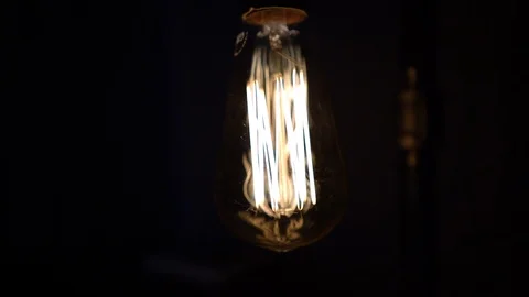Edison Light Bulb Handheld Rotation Stock Footage 102348853