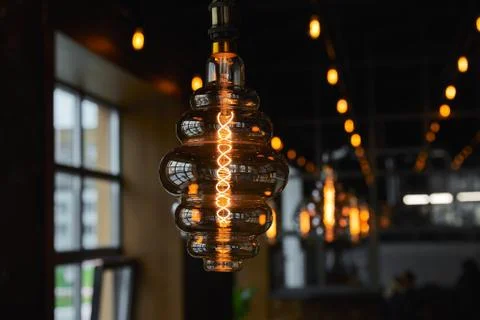 Edison light bulb in the interior of a cafe Stock Photos