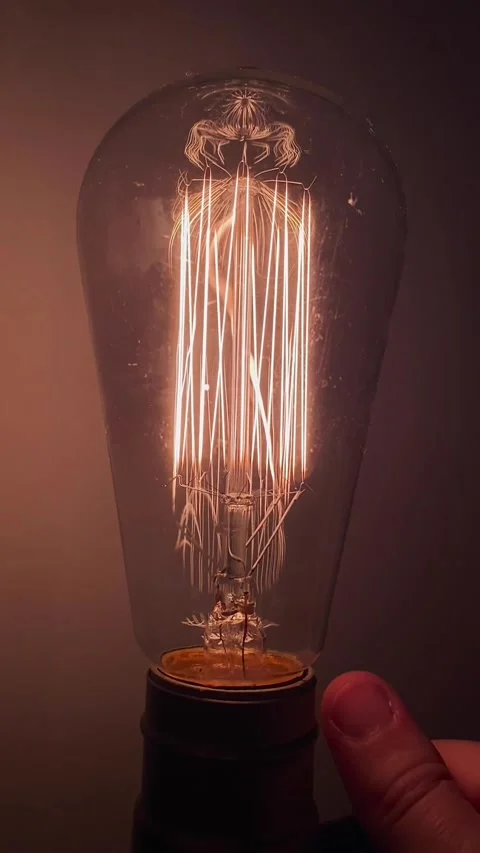 Edison Light Bulb Turning On and Off Stock Footage 201306530