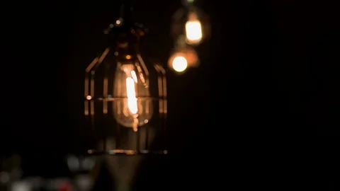 Edison light in cage studio dark background Stock Footage 81044100