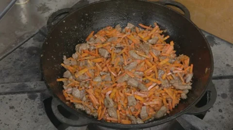 EDIT Adding water in stewed carrot and pork Stock-Footage 7752999