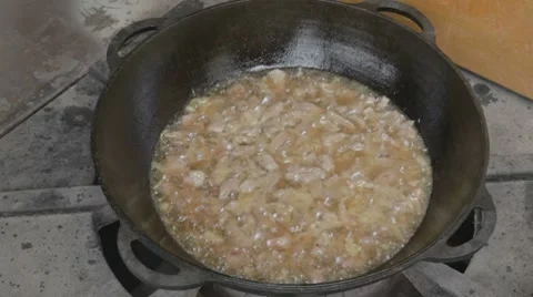 EDIT Boiling juice-filled water with pork and onion Stock Footage 7752967