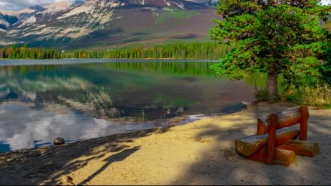 Edith Lake Reflections On a Beach Bench Time Lapse 4k Stock Footage 134663627