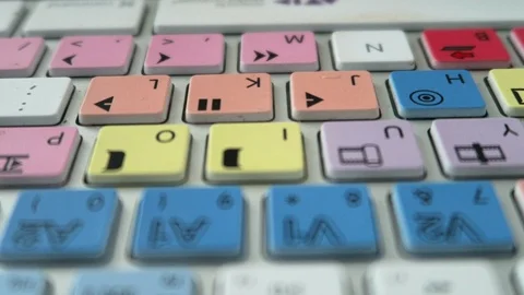 Editing keyboard Avid  fingers press play, pause Stock Footage 112854030