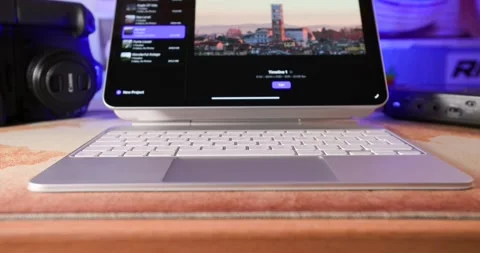 Editing Setup Featuring iPad and Keyboard with Final Cut Pro on Desk Stock Footage 297732394