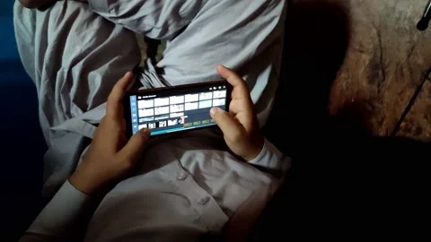 Editing Video in Cell Phone Using Kinemaster app 動画素材 199774761