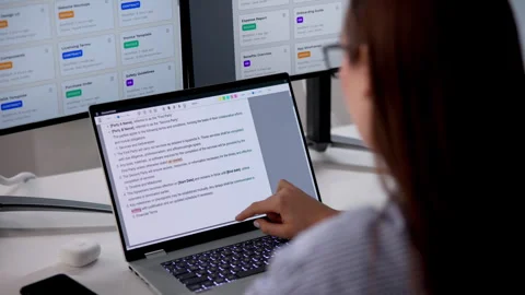 Editor Carefully Reviews And Corrects Text Stock Footage 333842911