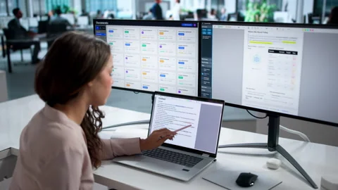 Editor Carefully Reviews And Corrects A Woman’s Laptop Text Stock Footage 335459199