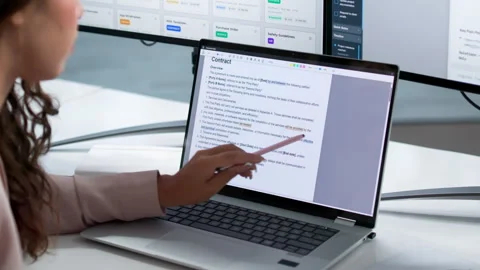 Editor Carefully Reviews And Corrects A Woman’s Laptop Text Stock Footage 336377339