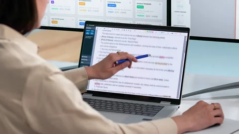 Editor Reviews And Corrects Text Documents Stock Footage 338171870