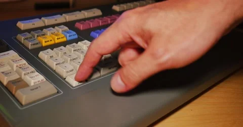 Editor Using Video Assembly Workstation Controller Stock Footage 64055039