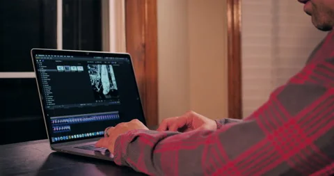 Editor works on motion graphics at home office. Stock Footage 141231729