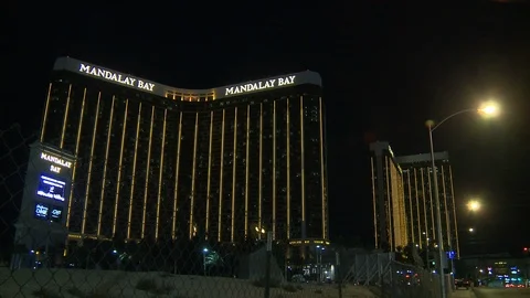 Editorial - 10-8-17 - Las Vegas Shooting Scene - Pan Left Mandalay Bay Police Video stock 99377445