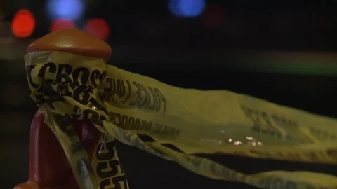 Editorial - 10-8-17 - Las Vegas Shooting Scene - LVPD Crime Tape Bokeh Stock Footage 99377700