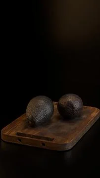 Editorial 3D render of avocados on cutting board with cinematic studio lighti Stock Illustration