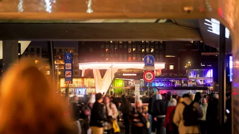 Editorial 4K Commuters Walking Through IJ Passage at Amsterdam Central Station Stock Footage 339048850