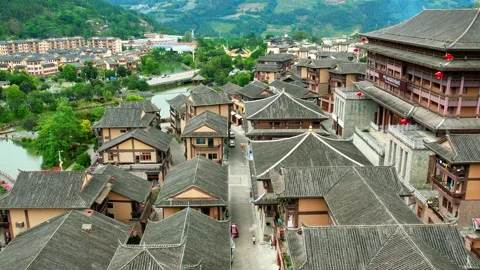 Editorial 4K Drone Skimming Over Grey Tiled Roofs in Ancient Town Stock Footage 332386742