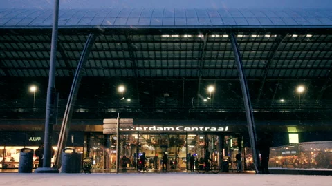 Editorial 4K Rear View of Amsterdam Central Station During Snow Stock Footage 338445792