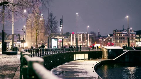 Editorial 4K Stationsplein Facing Basilica of St. Nicholas in Snow Stock Footage 338428174