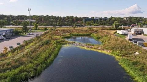 Editorial Aerial Hyperlapse – Retention Pond and Highway 400 in Ontario Video stock 316992148
