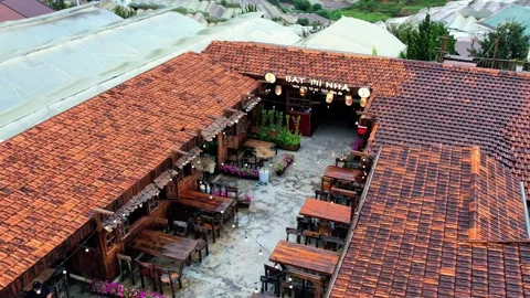 Editorial aerial orbit around vintage red tile roof houses in Da Lat 4K Vídeo Stock 341541853