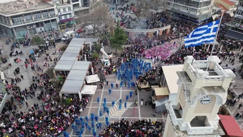 Editorial Aerial Orbit of Xanthi Clock Tower during Carnival Parade, Greece Stock-Footage 332767173