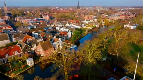 Editorial Aerial View of Breukelen Canal Houses and Bridge 4K Stock Footage 334518245
