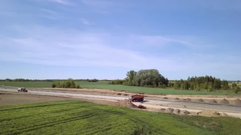 Editorial aerial view of road construction near Pułtusk, Poland Stock Footage 317751191