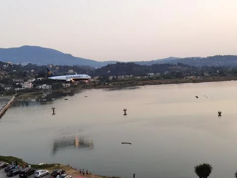 EDITORIAL: AIRPLANE LANDING, 3 AUGUST 2021, CORFU AIRPORT, GREECE, airplane l Stock Photos