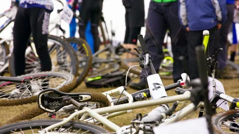 Editorial. Bicycles lie on the ground before the competition. Stock Footage 120424537