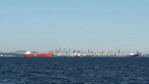 EDITORIAL. Camera pan from water to Vancouver shore, Canada. Stock Footage 314028200