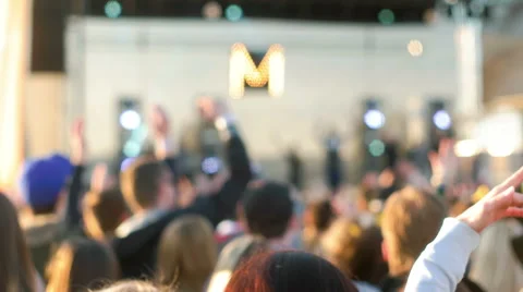 Editorial - Cheering to a Band on the Stage Video stock 63109786