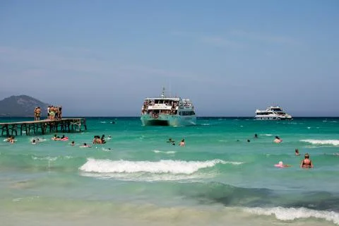 EDITORIAL: Cruise excursion ship is arriving to Playa de Muro beach Stock Photos