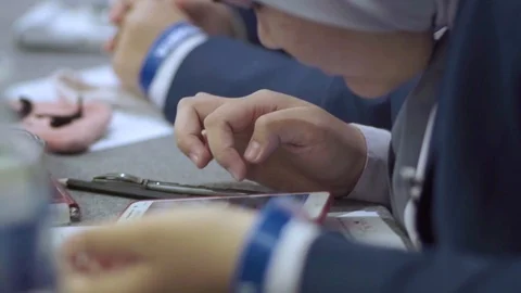Editorial - Delegates texting with her smart phone. Stock Footage 104016996