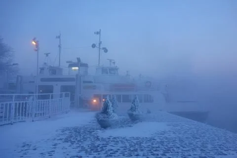 EDITORIAL: Ferry in Suomenlinna fortress island on extremely cold winter morning Stock Photos