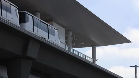 Editorial Footage - LAX SkyLink Train Departs In Shadows: May 7, 2026 Stock Footage 337678591