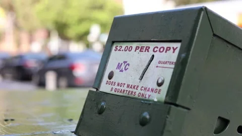 Editorial Footage - Old Newspaper Stand Coin Receptacle: Apr 26, 2026 Stock Footage 333544607