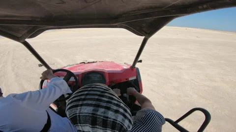 EDITORIAL GO PRO???? Couple driving a buggy car through the desert - thrill s Stock Footage 156507683