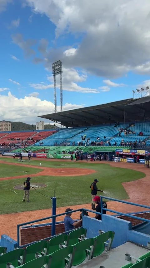 Editorial: Groundskeeper Watering Baseball Field Before Game - Maracay Stock Footage 330537503