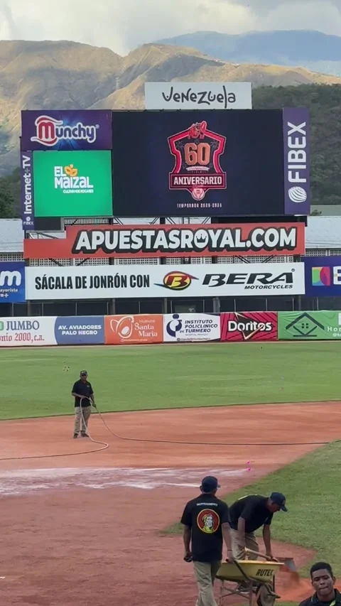 Editorial: Groundskeeper Watering Baseball Field Before Game - Maracay Stock Footage 330537504
