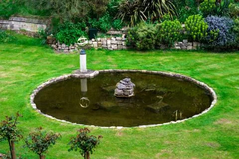 EDITORIAL: Inner garden with a small pond and a fountain in Windsor Castle Stock Photos