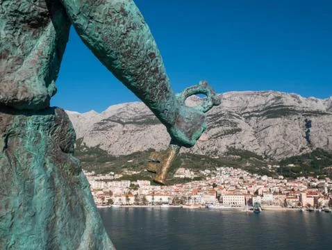 Editorial - Key in hand of Saint Peter monument in Makarska Stock Photos