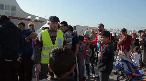 EDITORIAL: Long Queue of Syrian refugees hungry for a meal in a tent camp Stock Footage 61933244